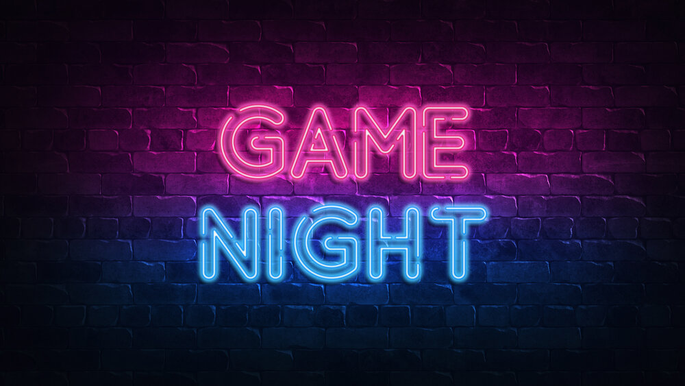 game night neon sign. purple and blue glow. neon text. Brick wall lit by neon lamps. Night lighting on the wall. 3d illustration. Trendy Design. light banner, bright advertisement